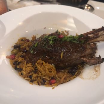 Registry Bistro - Moroccan Braised Lamb Shank with Pomegranate - New American Near Me - Toledo, Ohio Registry Bistro - Moroccan Braised Lamb Shank with Pomegranate - New American Near Me - Toledo, Ohio