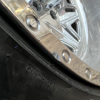 Goodyear Auto Service - Big chunk of rim missing also paint from whatever machine was used and Check the tire it's there too - Tires Near Me - Memphis, Tennessee