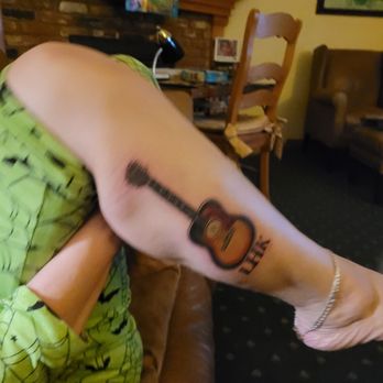 Pacific Sangha Tattoo - This replica of our father's guitar is "spot on." Thank you, John Lewis - Piercing Near Me - Redondo Beach, California Pacific Sangha Tattoo - This replica of our father's guitar is "spot on." Thank you, John Lewis - Piercing Near Me - Redondo Beach, California