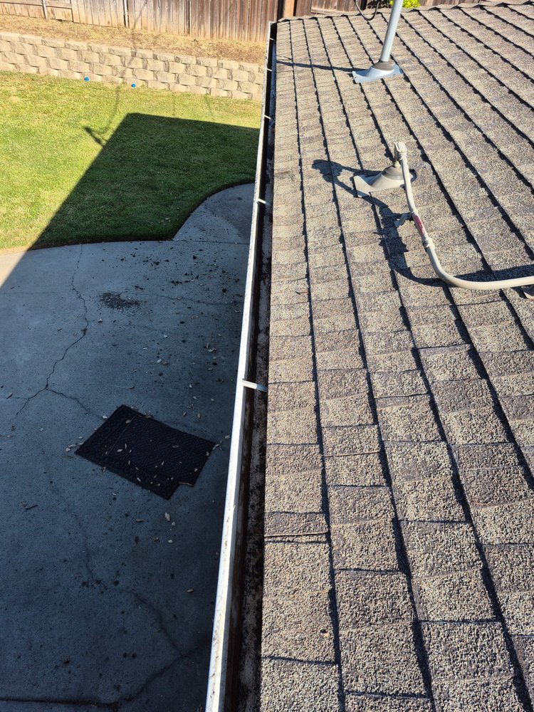 Slide of Cleaning Gutters Service