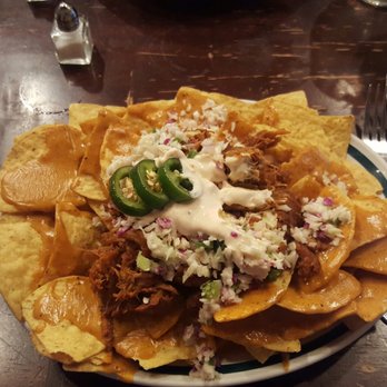 Grape Juice - Pulled pork nachos with a man-sized serving of pork and fresh japs! - Wine Bars Near Me - Kerrville, Texas