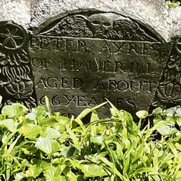 Death head commonly seen on Puritan's grave markers Death head commonly seen on Puritan's grave markers