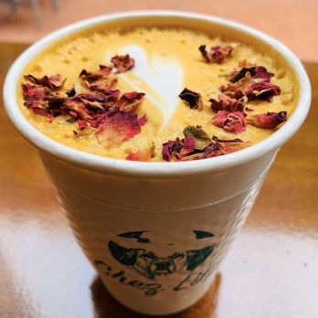 Chez Lily - Spicy Chai Tumeric Latte...w/ edible Rose Petal Finisher...kinda cool!  A Thumbs Up!..& Perfect for the cold season!! - Bakeries Near Me - Washington, DC, District of Columbia