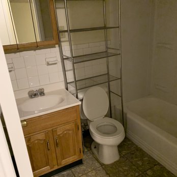 Bathroom With New Mirror Vanity And Extra Rack Over Toilet Yelp Bathroom With New Mirror Vanity And
