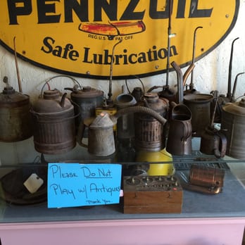 Oatman Hotel - Antique Oil Cans! - American Near Me - Oatman, Arizona