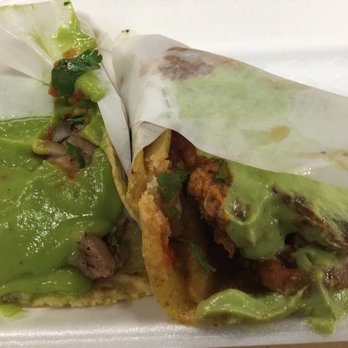 Tacos La Central - Two tacos just hanging out waiting to be devoured - Mexican Near Me - Colton, California Tacos La Central - Two tacos just hanging out waiting to be devoured - Mexican Near Me - Colton, California
