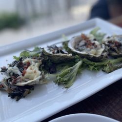 Between the Antlers - Illegal Grilled Oysters - house smoked bacon, breadcrumbs, minced baby collards, parmesan, drawn Irish butter (& onions)