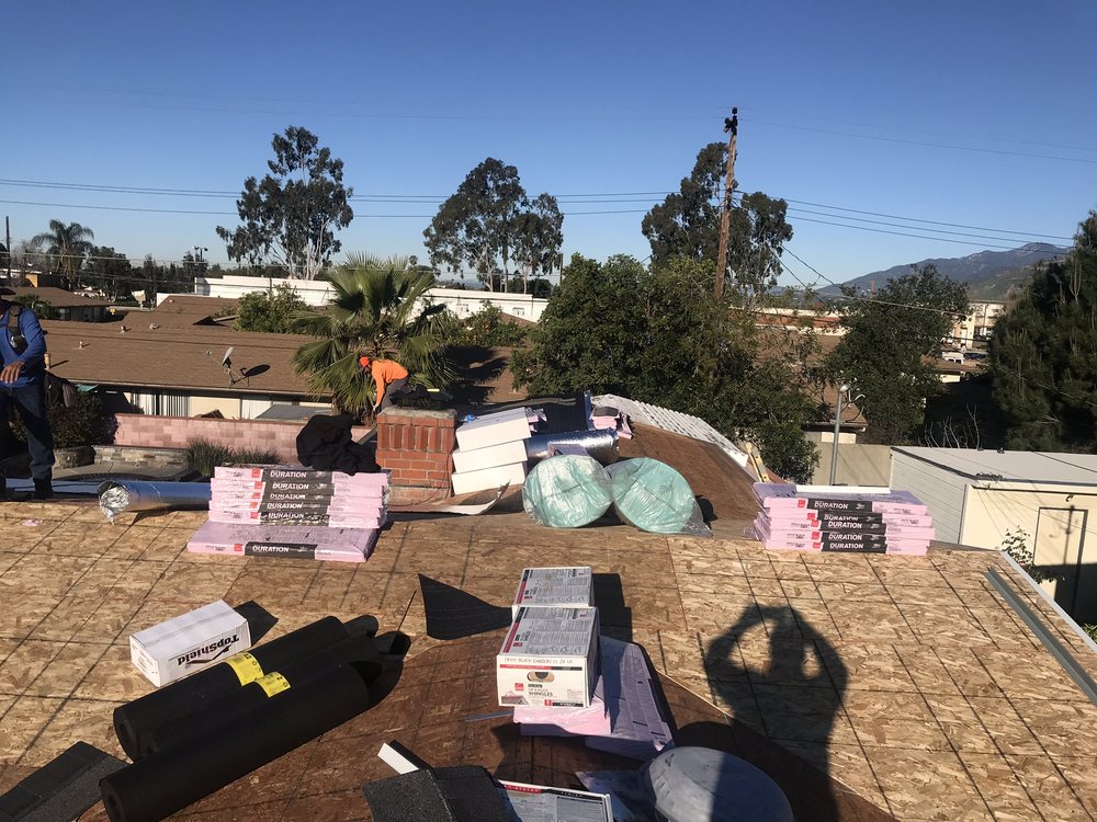 Slide of MA Roofing and Gutters