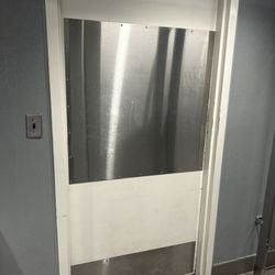 Bathroom door on the inside ... does this keep the door clean and easy to wash when you have grubby hands?