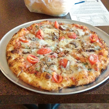 Knuth Brewing Company - this is the wood fired pizza I got. Dave's a red sauce with fresh basil and garlic, mushrooms and tomatoes, sausage and cheese. - Coffee & Tea Near Me - Ripon, Wisconsin