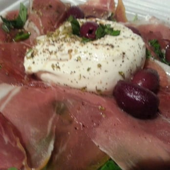 Elio Pizza On Fire - Burrata app with tons of arugula, prosciutto, and kalamata olives - Pizza Near Me - Addison, Illinois Elio Pizza On Fire - Burrata app with tons of arugula, prosciutto, and kalamata olives - Pizza Near Me - Addison, Illinois