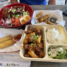 Chicken katsu rice bowl Beef gyoza, spring rolls and spicy soy garlic chicken bowl Chicken katsu rice bowl Beef gyoza, spring rolls and spicy soy garlic chicken bowl