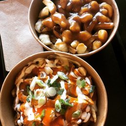 Buffalo chicken and classic Canadian poutine. Buffalo chicken and classic Canadian poutine.