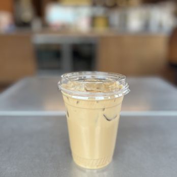 Little Flower - Iced Latte (~$5.50) with rose syrup (50¢) and oat milk - Coffee & Tea Near Me - Astoria, New York Little Flower - Iced Latte (~$5.50) with rose syrup (50¢) and oat milk - Coffee & Tea Near Me - Astoria, New York