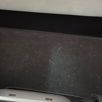 Hudson View Car Wash - Interior floor a minutes after they supposedly vacuumed it. - Car Wash Near Me - North Bergen, New Jersey