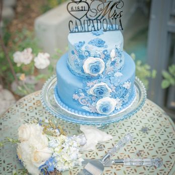 Red Carpet Cookies - a blue wedding cake on a table - Caterers Near Me Red Carpet Cookies - a blue wedding cake on a table - Caterers Near Me