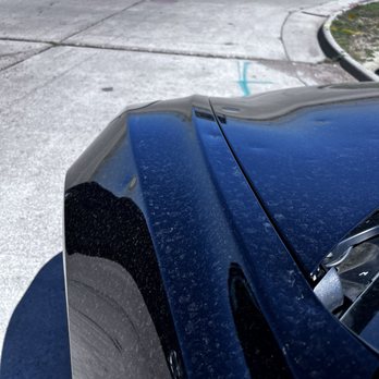 Budget - Dirty car with dents from the hailstorm - Car Rental Near Me - Denver, Colorado