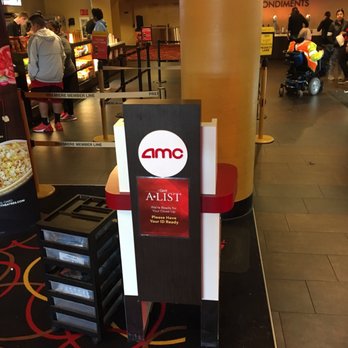 AMC Factoria 8 - Ticket taker booth. This is still done manually. On a Friday or Saturday night, this can become Bottleneck Lane. - Cinema Near Me - Bellevue, Washington AMC Factoria 8 - Ticket taker booth. This is still done manually. On a Friday or Saturday night, this can become Bottleneck Lane. - Cinema Near Me - Bellevue, Washington
