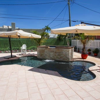 Very Important Paws - Let your dog cool off and play with he/her pals in our in ground bone shaped pool? We are the only resort in the area to offer this amenity. - Pet Groomers Near Me - West Palm Beach, Florida Very Important Paws - Let your dog cool off and play with he/her pals in our in ground bone shaped pool? We are the only resort in the area to offer this amenity. - Pet Groomers Near Me - West Palm Beach, Florida