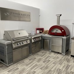 Garco Grills & More - Premium Twin Eagles grill, griddle side burner, storage, Alfa pizza oven, Summit fridge in Graysen Woods RTF island structure - on display!