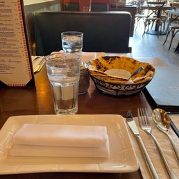 Table set with complimentary pita and dip Table set with complimentary pita and dip