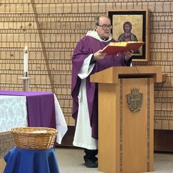 Redemptorist Retreat Center - Father presenting the Gospel.
