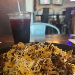 Carnitas Chips and Agua de Jamaica