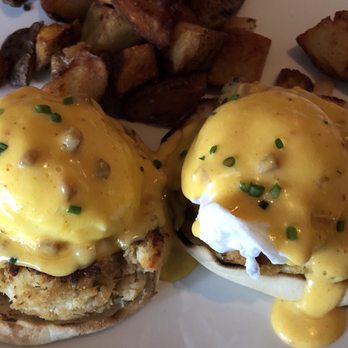 Red Feather Kitchen - Eggs Baltimore - English muffin, crab cakes, tobassco hollandaise, breakfast potatoes - New American Near Me - Cincinnati, Ohio Red Feather Kitchen - Eggs Baltimore - English muffin, crab cakes, tobassco hollandaise, breakfast potatoes - New American Near Me - Cincinnati, Ohio