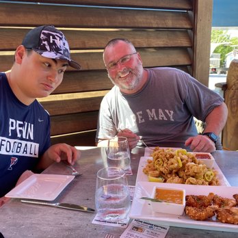 Square Grouper - Islamorada - Declan and Danny with coconut shrimp and fried calamari! - Seafood Near Me - Islamorada, Florida
