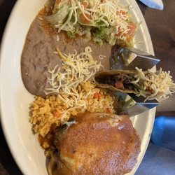 El Cajete - Cheese enchilada, chile relleno, and crispy American-style taco combo with rice and beans