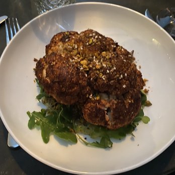 Eberly - Cauliflower steak - Bars Near Me - Austin, Texas Eberly - Cauliflower steak - Bars Near Me - Austin, Texas