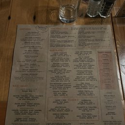 a menu on a wooden table