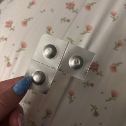 Walgreens - Three pills obviously ripped from the original packaging.