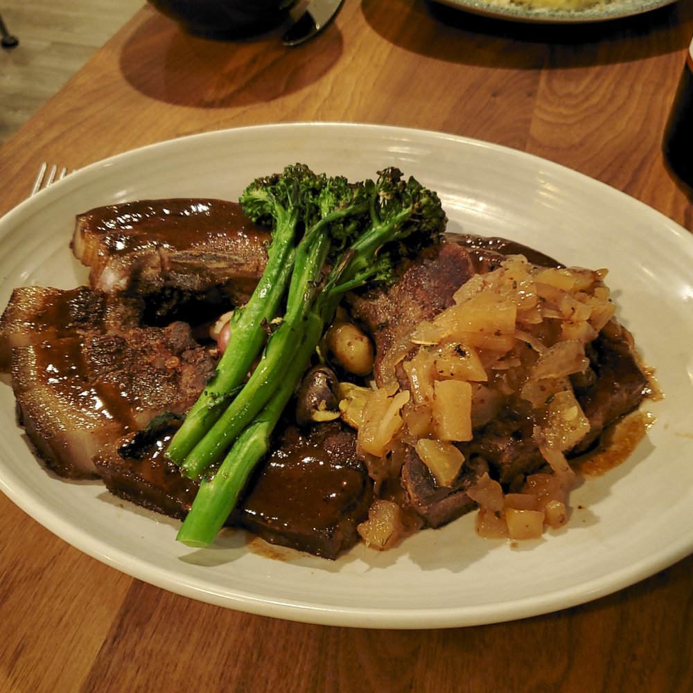 Brix 25 - Smoked porterhouse porkchop. - New American Near Me - Gig Harbor, Washington