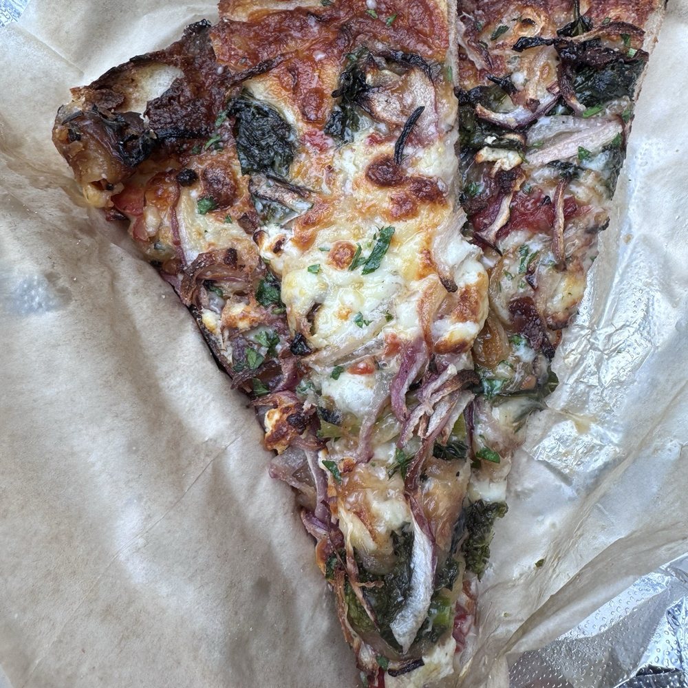 Nabolom Bakery & Pizzeria - Pizza slice of the day - Bakeries Near Me - Berkeley, California Nabolom Bakery & Pizzeria - Pizza slice of the day - Bakeries Near Me - Berkeley, California