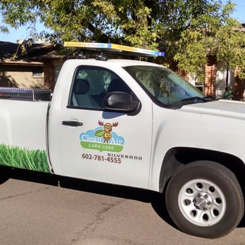 Clean Air Lawn Care - Our truck with a rooftop solar panel for charging lawn equipment. - Landscaping Near Me Clean Air Lawn Care - Our truck with a rooftop solar panel for charging lawn equipment. - Landscaping Near Me