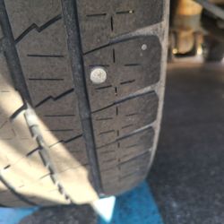 Menards - Nails in their driveway