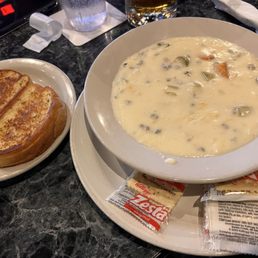 Bowl of Creamy Wild Rice Chicken Soup with a side of Garlic Toast Bowl of Creamy Wild Rice Chicken Soup with a side of Garlic Toast