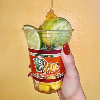 Pulp Juice And Smoothie Bar - a hand holding a cup - Juice Bars & Smoothies Near Me - Solon, Ohio Pulp Juice And Smoothie Bar - a hand holding a cup - Juice Bars & Smoothies Near Me - Solon, Ohio
