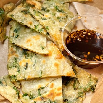 Mama Yang and Daughter - Hand-Kneaded Scallion Pancake -- $3.80 for 6 slices - Taiwanese Near Me - Nashville, Tennessee Mama Yang and Daughter - Hand-Kneaded Scallion Pancake -- $3.80 for 6 slices - Taiwanese Near Me - Nashville, Tennessee