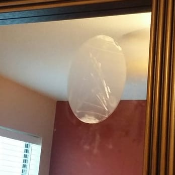 Rooms To Go - Mirror delivered with a sticker attached, and the sticky residue can't be removed. - Furniture Stores Near Me - San Antonio, Texas