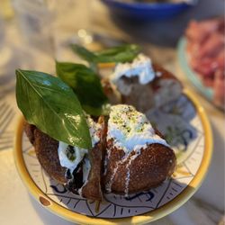 Pink Mamma - Focaccia with burrata cheese and basil on top