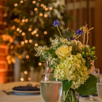 A2 Imagine Events | Anna's Flowers - One of our table centerpieces... formerly pew decor - Wedding Planning Near Me A2 Imagine Events | Anna's Flowers - One of our table centerpieces... formerly pew decor - Wedding Planning Near Me
