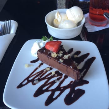Bistro Casanova - Chocolate moose cake is a little taste of heaven!! I recommend getting with a scoop of ice cream :) - Mediterranean Near Me - Kahului, Hawaii