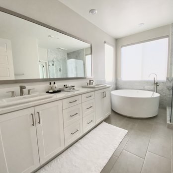 Builderwell Design & Build - AFTER: I am so pleased with the new HUGE circle tub, freestanding tub filler, and the new frameless marble shower. - General Contractors Near Me - Irvine, California