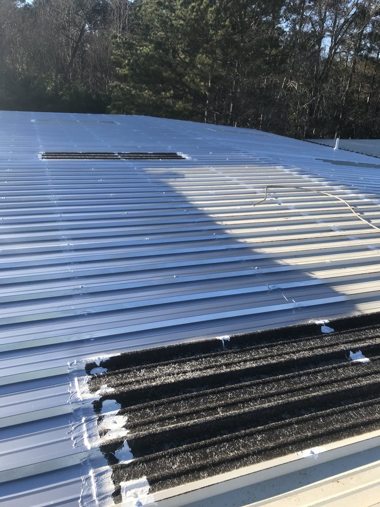 Slide of Advanced Roofing & Paving