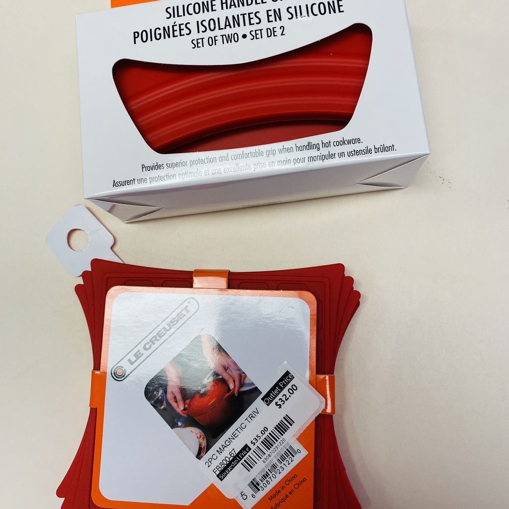 Le Creuset Outlet Store - Silicone Handle Grips and small magnetic trivets - Tableware Near Me - Woodburn, Oregon Le Creuset Outlet Store - Silicone Handle Grips and small magnetic trivets - Tableware Near Me - Woodburn, Oregon