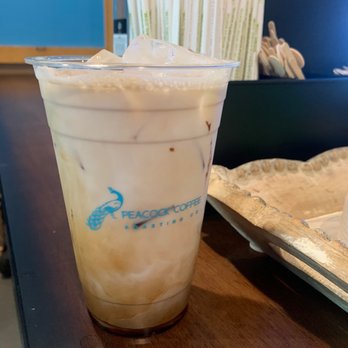 The Peacock - Yummmm....  Iced Oakmilk latte - Coffee & Tea Near Me - Kennewick, Washington