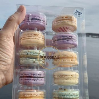 Rousseau Chocolatier - a person holding a box of macarons - Chocolatiers & Shops Near Me - Halifax, Nova Scotia Rousseau Chocolatier - a person holding a box of macarons - Chocolatiers & Shops Near Me - Halifax, Nova Scotia