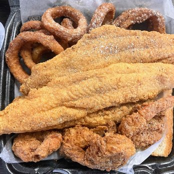 Texas Fish Chicken Grill - Fish and shrimp combo w/ 2 catfish fillet, 4 jumbo shrimp, onion rings, 2 slices of bread. - Chicken Wings Near Me - Arlington, Texas Texas Fish Chicken Grill - Fish and shrimp combo w/ 2 catfish fillet, 4 jumbo shrimp, onion rings, 2 slices of bread. - Chicken Wings Near Me - Arlington, Texas